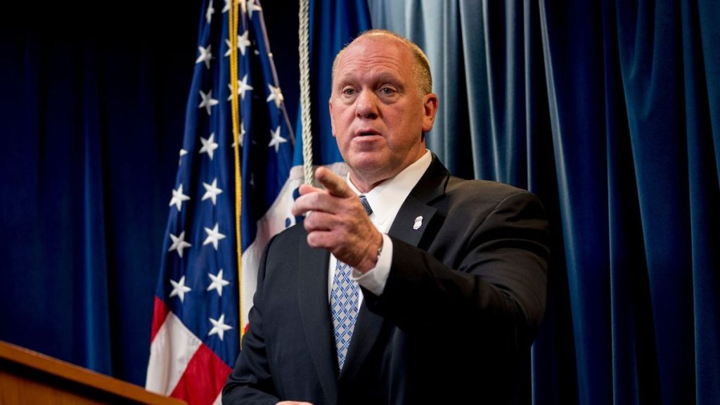 Tom Homan speaks to a reporter at a Department of Homeland Security news conference in Washington in 2017.