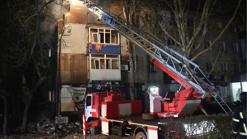 Rescue workers clear the rubble of a residential building destroyed by a Russian airstrike in Zaporizhzhia.