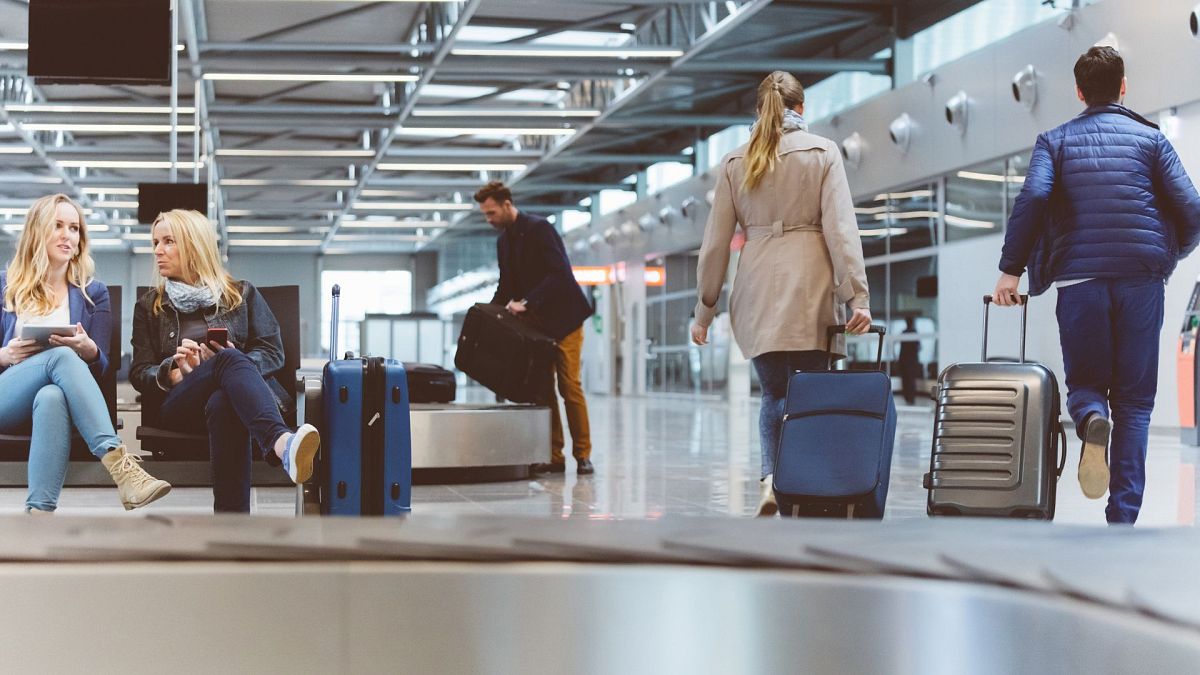 Passengers inside airport terminal