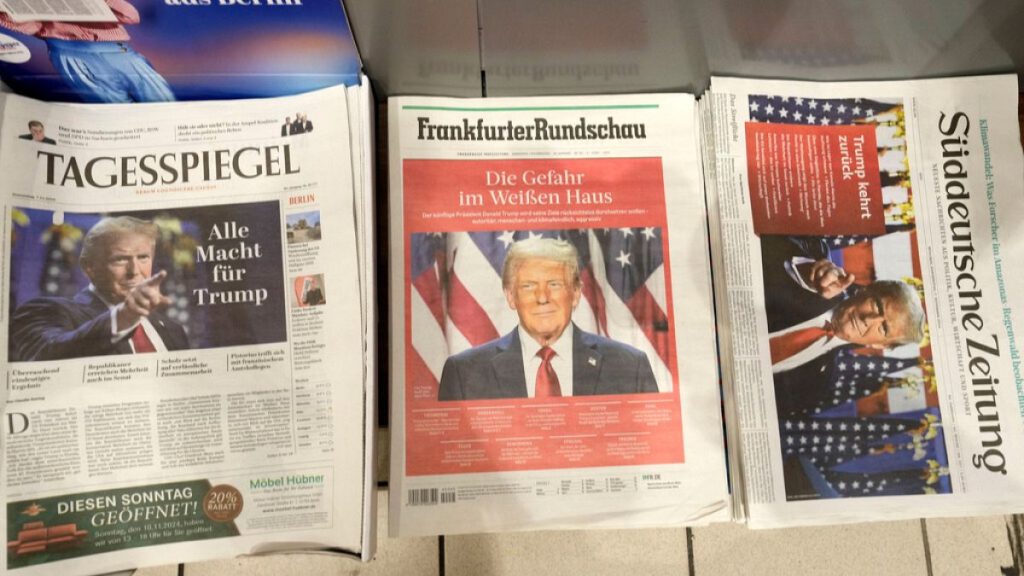 German newspapers front-pages with President-elect Donald Trump are seen at a station kiosk in Cologne, Germany, Thursday, Nov. 7, 2024.