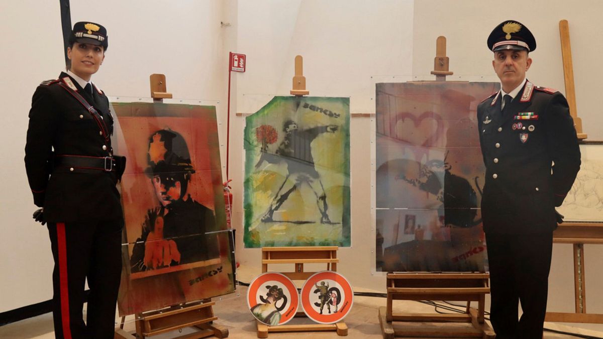 Fake Banksy artworks that were sized by police are show in Rome in this handout image provided by the Italian Culture Ministry on Tuesday, Oct. 15, 2024. (AP Photo/Italian Cul