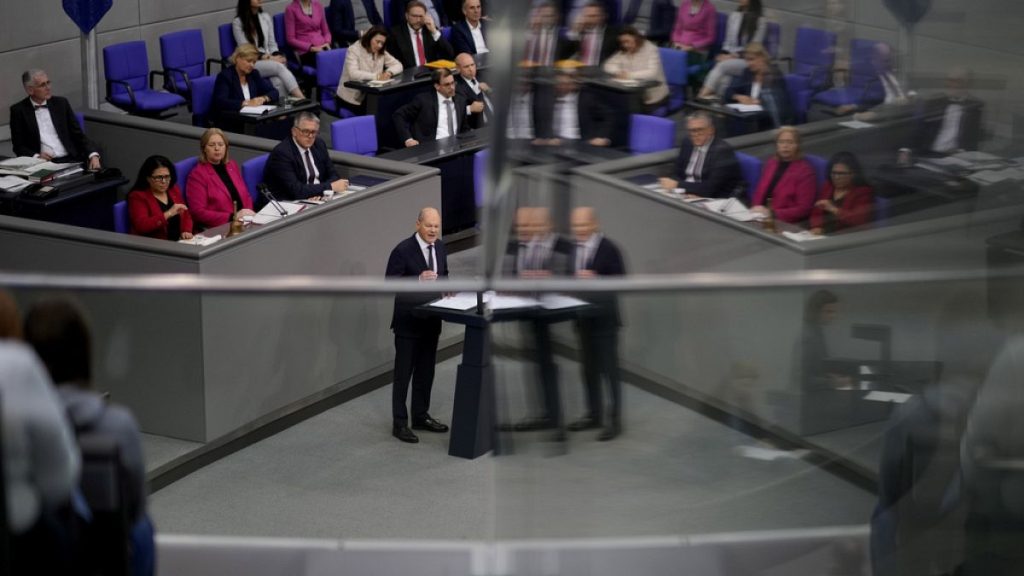 German Chancellor Olaf Scholz delivers his government statement in the German parliament Bundestag in Berlin, Germany, Wednesday, Nov. 13, 2024.