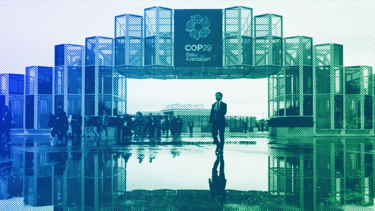 Attendees arrive for the day at the COP29 UN Climate Summit in Baku, November 2024