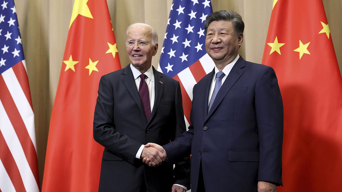 President Joe Biden shakes hands with Chinese President Xi Jinping before a bilateral meeting in Lima, 16 November, 2024