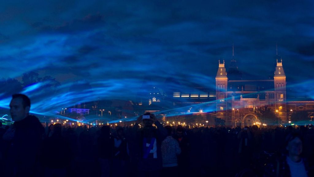 A light show by Dutch artist Daan Roosegaarde called Waterlicht, or Water Light, creates the impression of a flooded Museumplein square in Amsterdam, 2015.