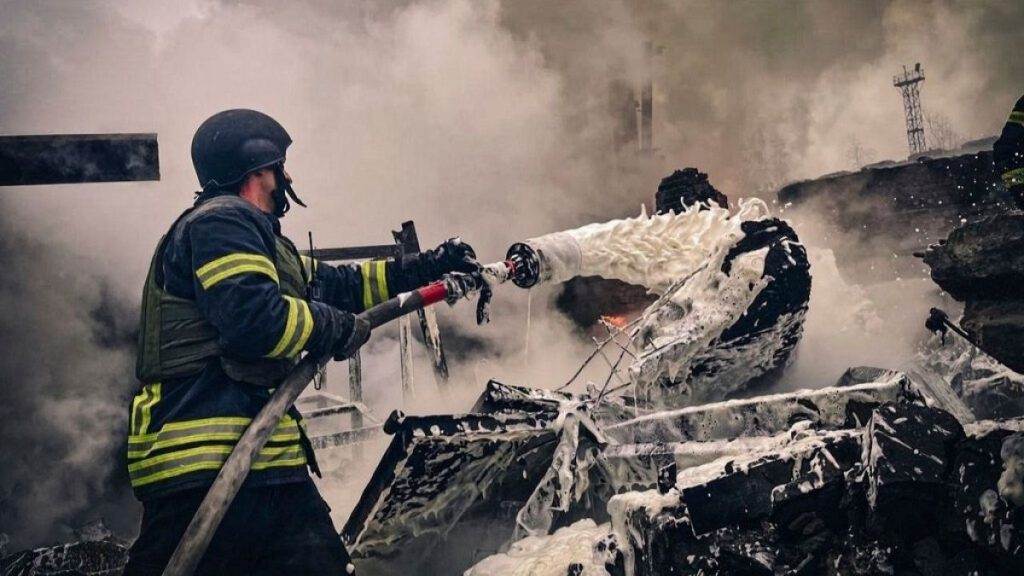 In this photo provided by the Ukrainian Emergency Service on Nov. 13, 2024, rescue workers extinguish a fire of a building destroyed by a Russian strike in Brovary, Kyiv.