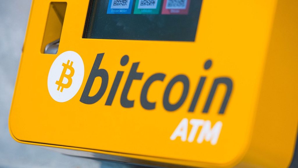 A Bitcoin ATM sits in October 2015. The value of the cryptocurrency hit a record high as Trump