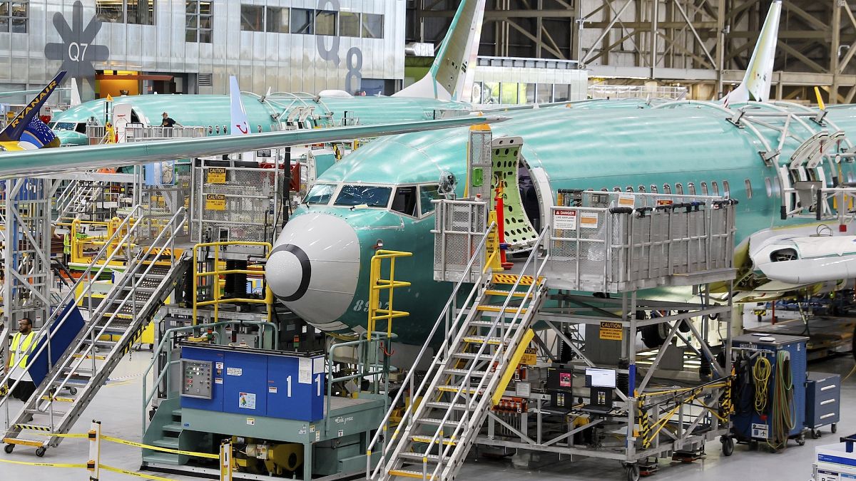 Boeing 737 MAX airplanes are seen on the assembly line at the Boeing facility in Renton, Washington, in June