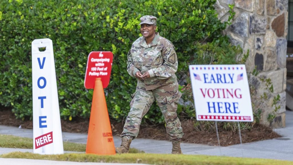 A US soldier is seen leaving a polling station on 31 October