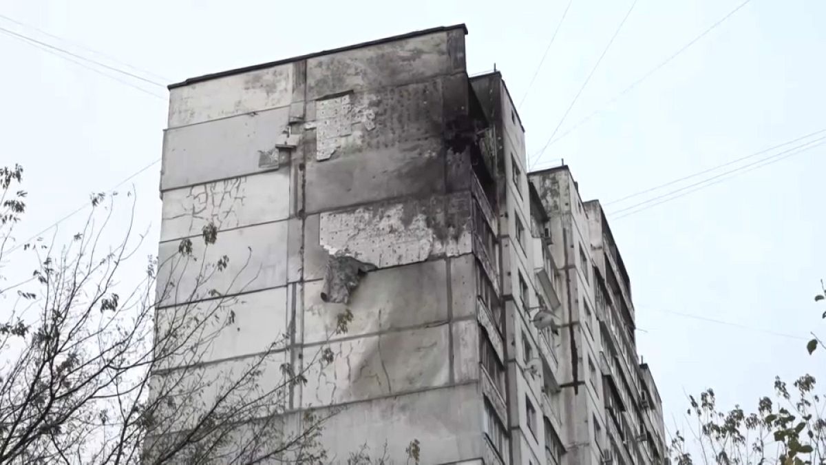 Damage to a downtown apartment and office block in Kyiv after Russian drone debris rained on the capital.