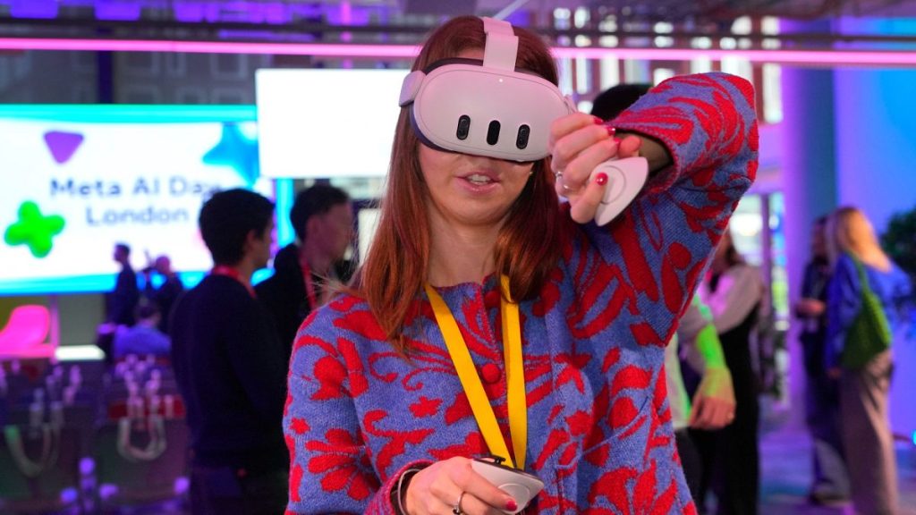 A visitor tries out a Meta Quest 3 headset at the Meta AI Day in London, Tuesday, April 9, 2024.