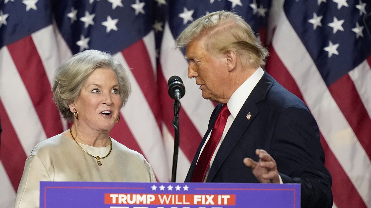 US President-elect Donald Trump brings Susie Wiles to the podium at an election night watch party in Florida, 6 November, 2024