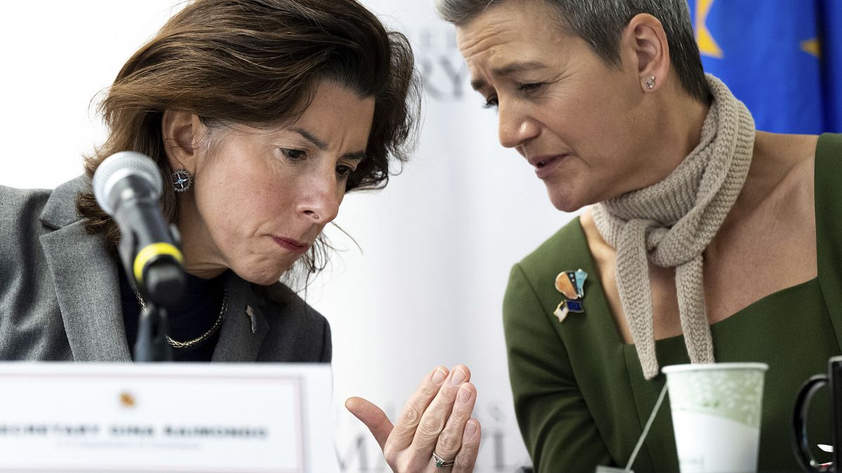 Commerce Secretary Gina Raimondo, left, speaks with European Commission Executive Vice President Margrethe Vestager.