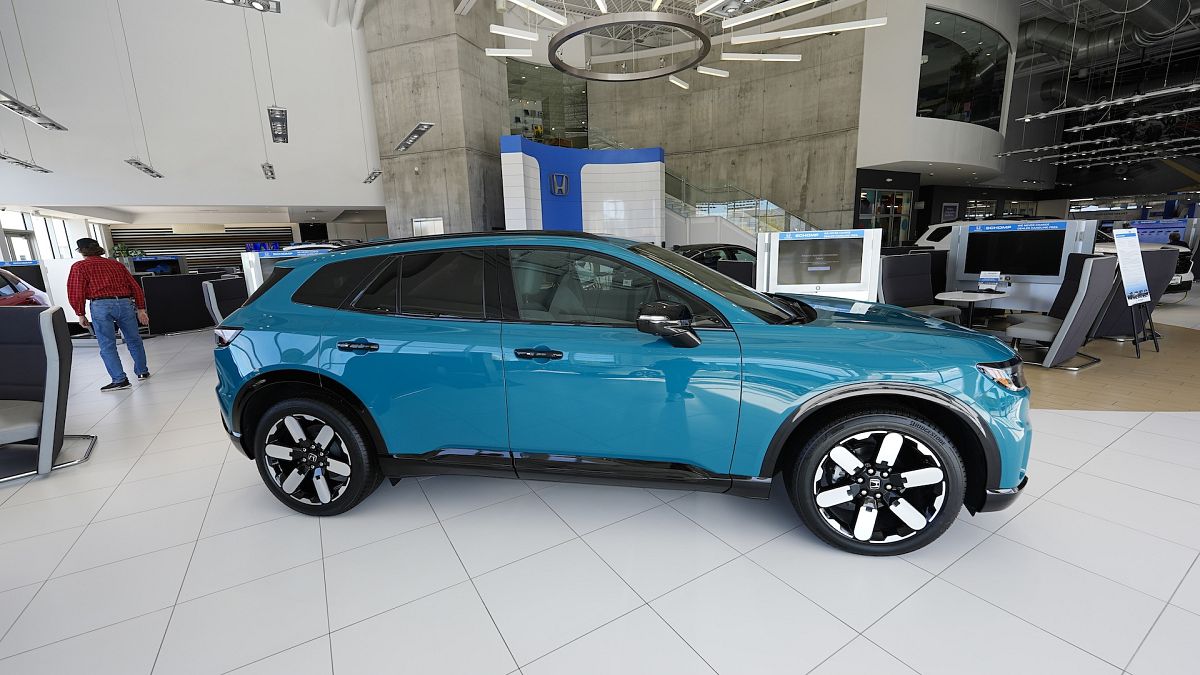 A Honda 2025 Prologue electric vehicle on display in a US showroom