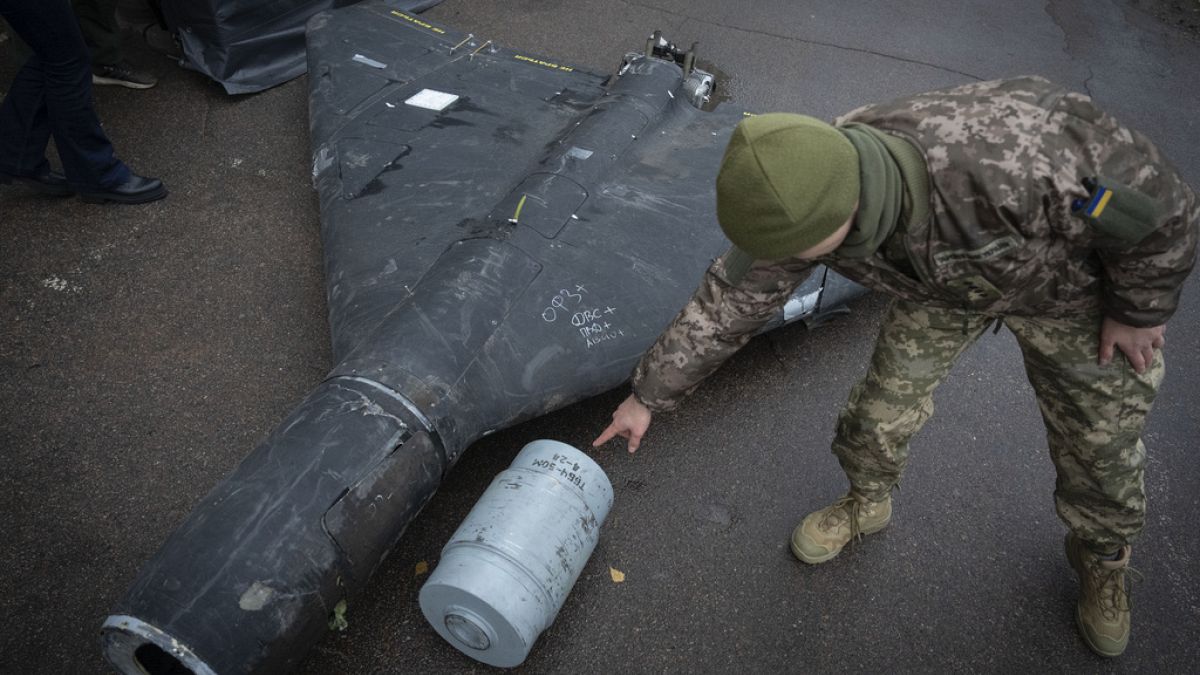 Ukrainian officer shows thermobaric charge of downed Shahed drone launched by Russia in a research laboratory in an undisclosed location in Ukraine Thursday, Nov. 14, 2024