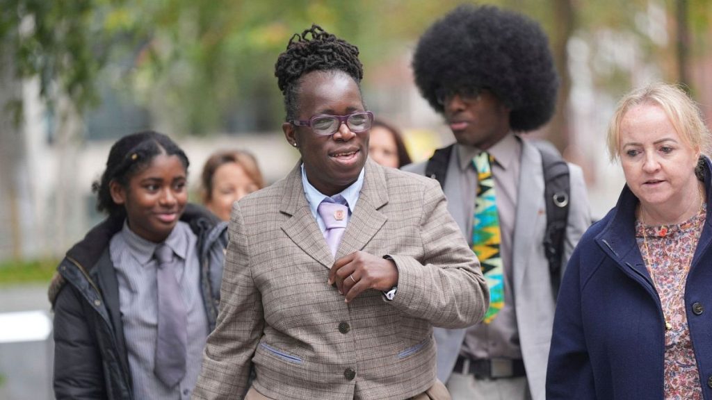 Rosamund Adoo-Kissi-Debrah, foreground centre, walks with Kerry Jack and her children after a meeting with Environment Minister Emma Hardy, London, 31 October 2024.