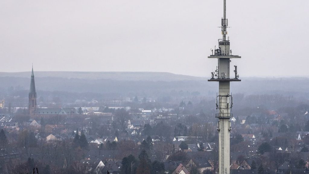 A radio mast for mobile communications is seen over the town of Bottrop, Germany.