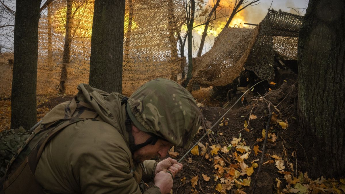 FILE - A serviceman of the 13th Brigade of the National Guard of Ukraine fires Giatsint-B gun towards Russian positions near Kharkiv, Ukraine, Wednesday, Nov. 6, 2024.