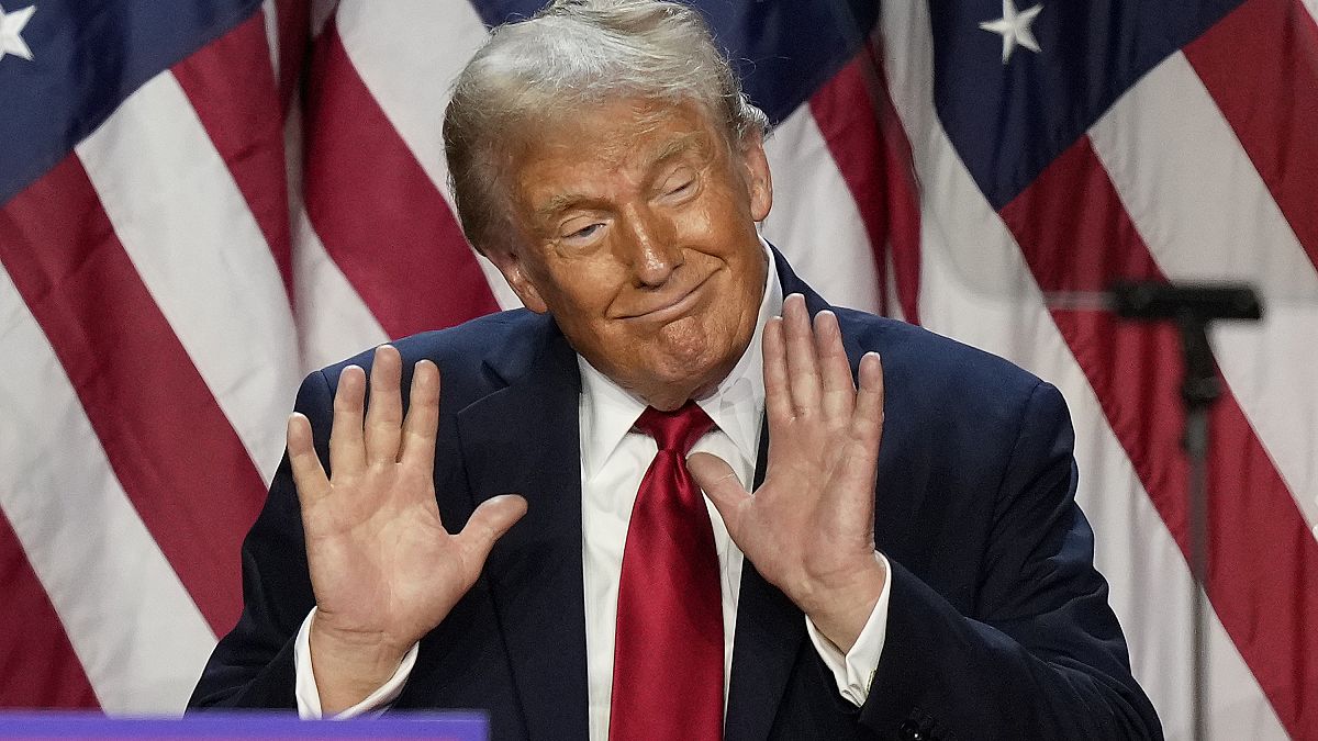 Republican presidential nominee former President Donald Trump dances after speaking at an election night watch party, Wednesday, Nov. 6, 2024, in West Palm Beach, Fla.