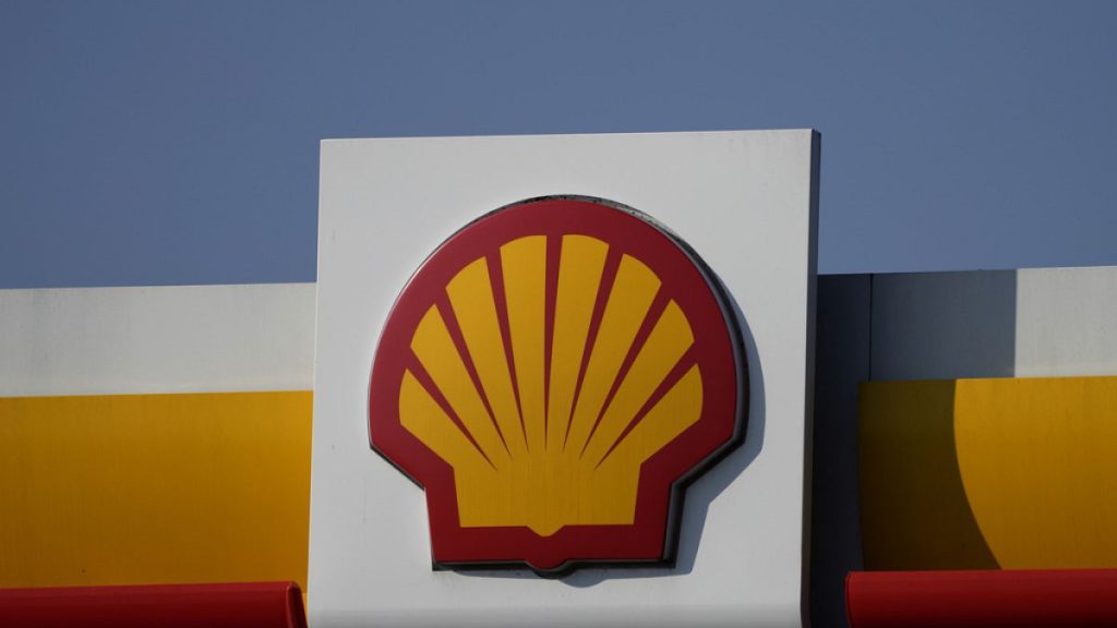 A Shell logo is displayed at a gas station in London, on March 8, 2022.