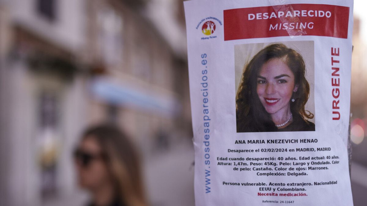 A banner of a Colombian-born American missing woman Ana Maria Knezevich Henao, 40, is displayed on a streetlight in Madrid, Spain, Feb. 16, 2024.