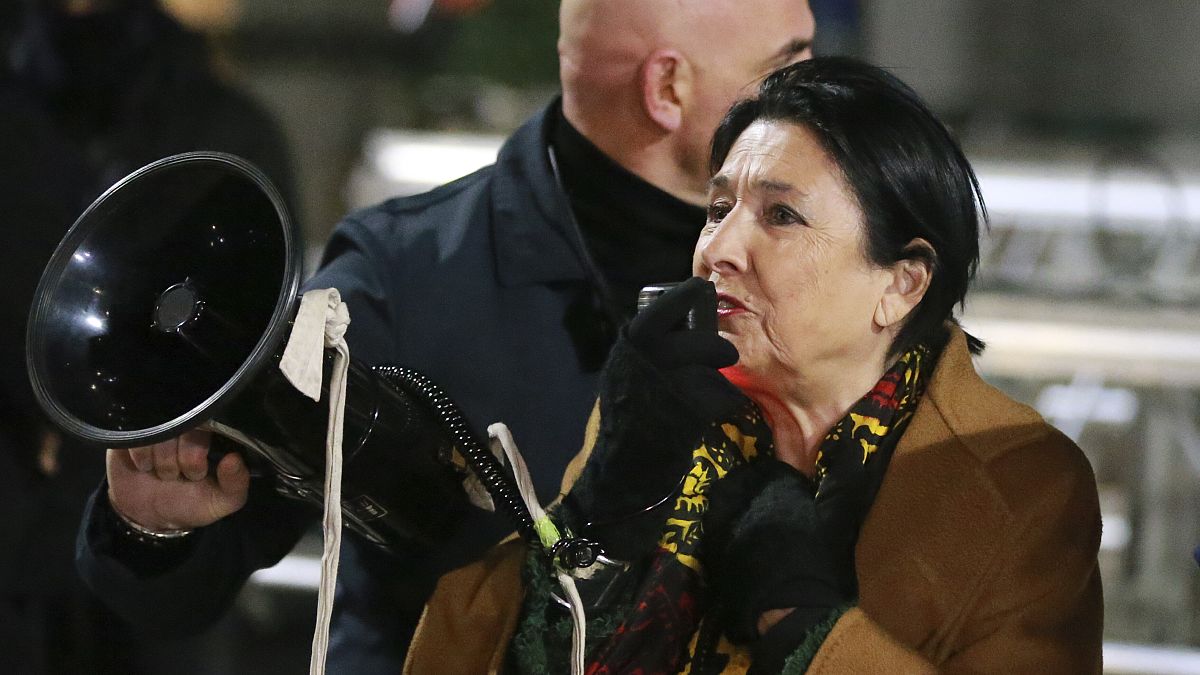 Georgian President Salome Zourabichvili speaks during an anti-government rally outside parliament in Tbilisi, 14 December, 2024