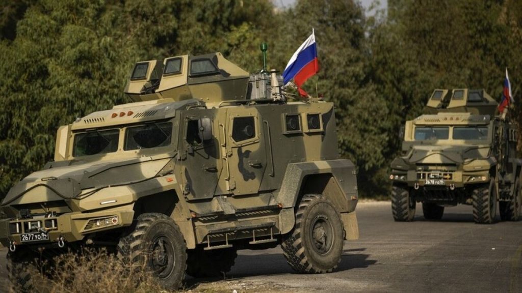 A Russian army convoy moves along a road near the Mediterranean town of Tartus, Syria, Monday Dec. 16, 2024