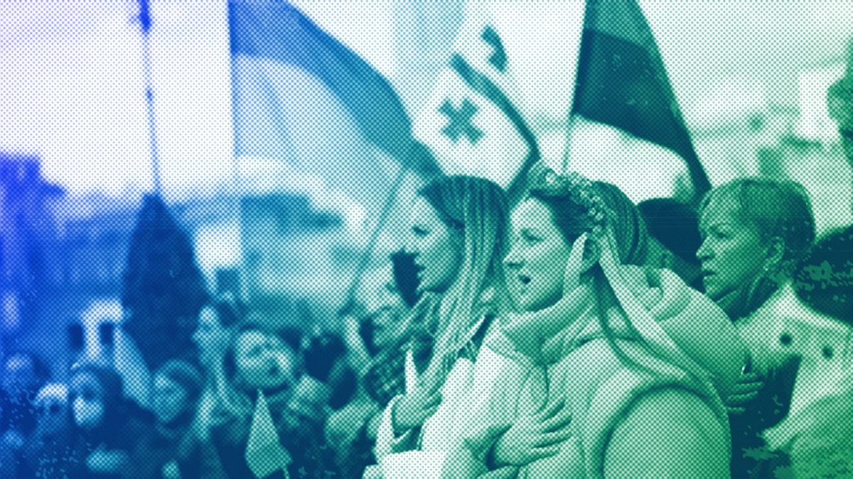 Members of the Ukrainian community sing their national anthem as they take part in a protest against the Russian invasion of Ukraine, March 2022