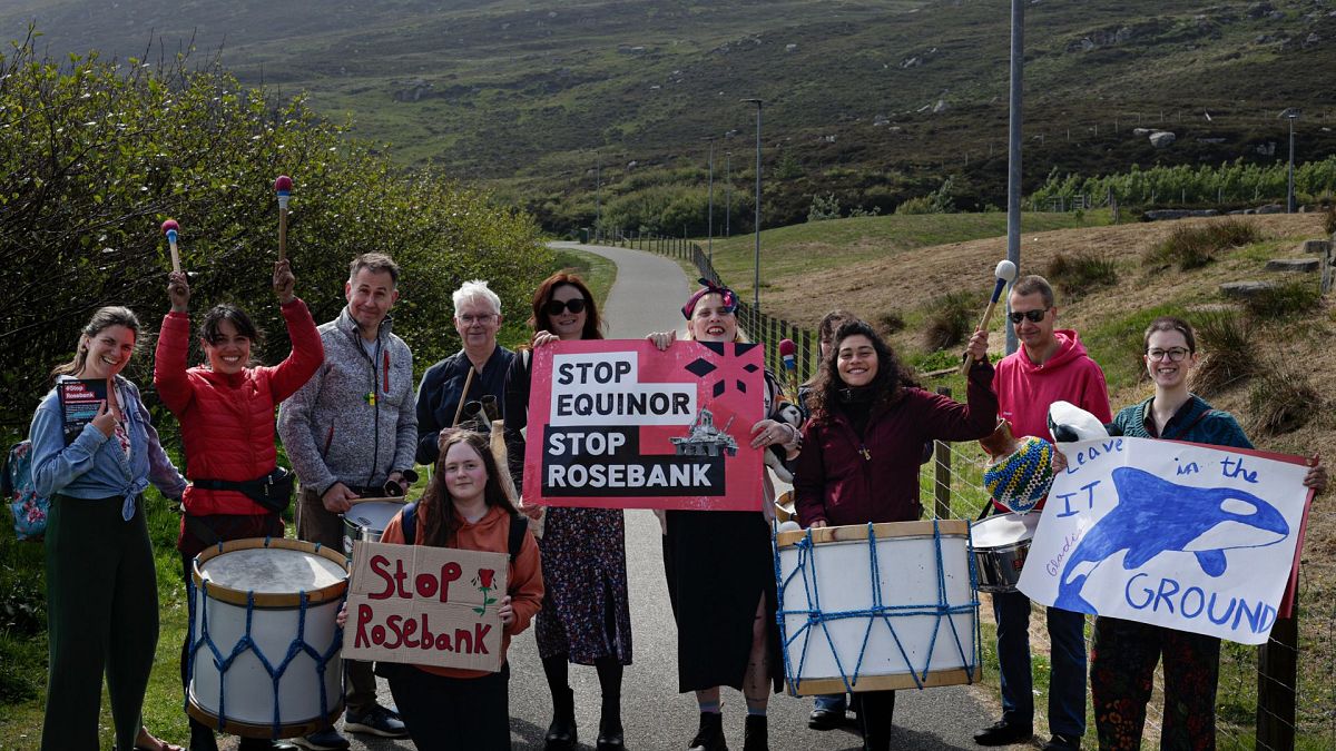 Climate activists protest the controversial untapped oil field in Shetland