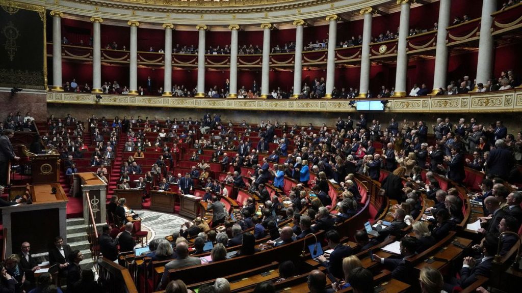 Lawmakers convene at the National Assembly during a debate and prior to a no-confidence vote that could bring down the Prime Minister and the government for the first time sin