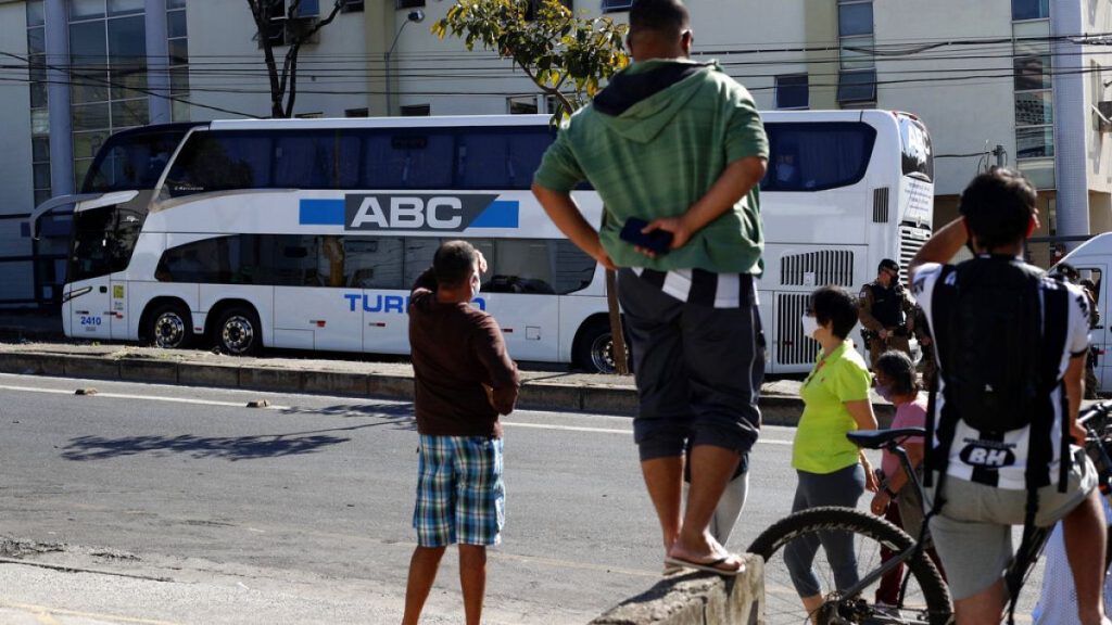 FILE - Bus parked outside a police station in Belo Horizonte, Brazil, Wednesday, July 21, 2021,