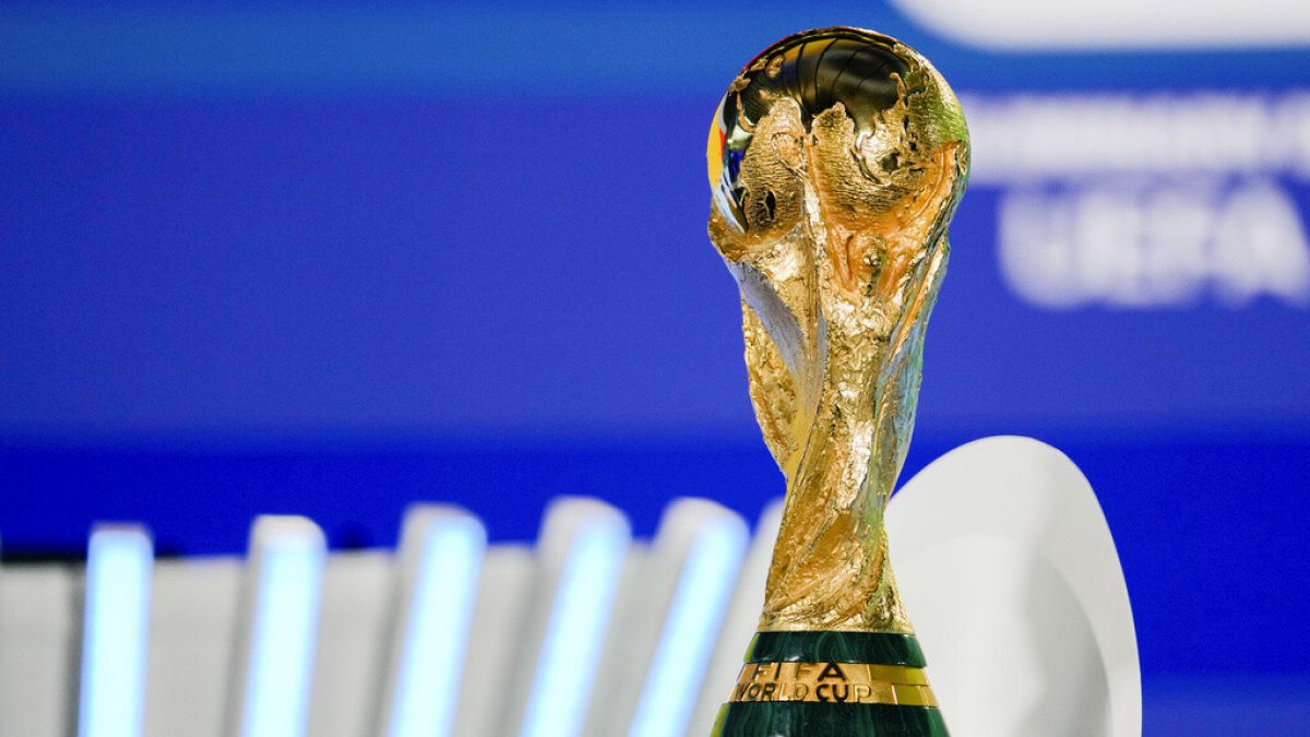 The FIFA World Cup 26 trophy is displayed during the UEFA preliminary draw at FIFA headquarters in Zurich, Switzerland, December 13, 2024