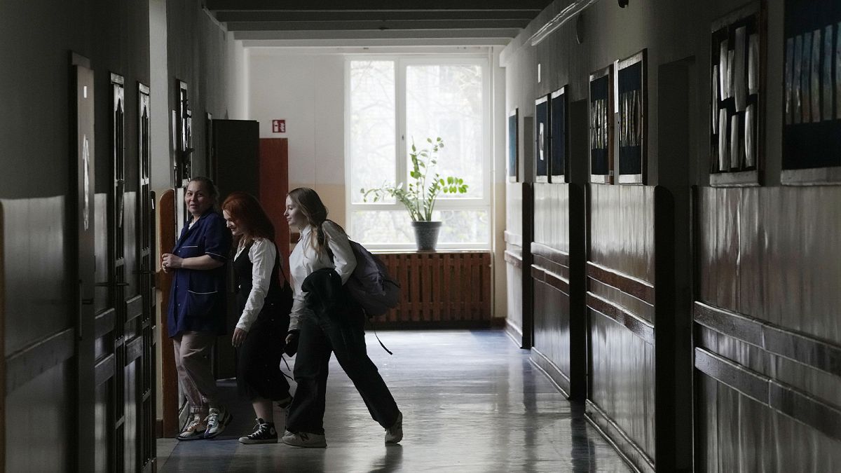 Children walk in the corridor of Primary School number 223 in Warsaw, 3 April 2024