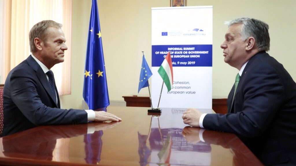 European Council President Donald Tusk, left, speaks with Hungarian Prime Minister Viktor Orban during a meeting prior to an EU summit in Sibiu, Romania, Thursday, May 9, 2019