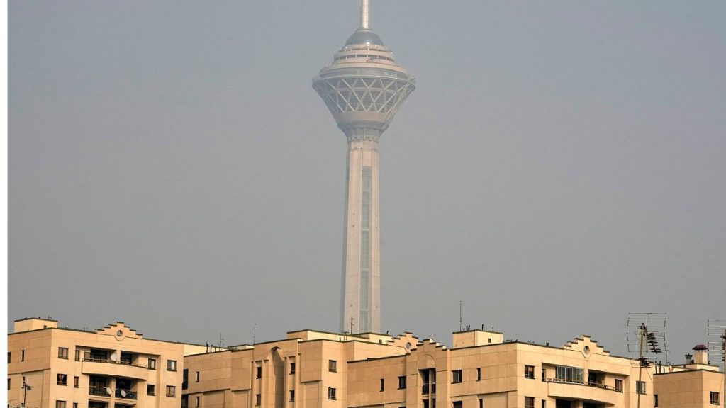 Milad telecommunication tower and buildings are seen amid air pollution in Tehran, Iran, Wednesday, 11 December 2024.