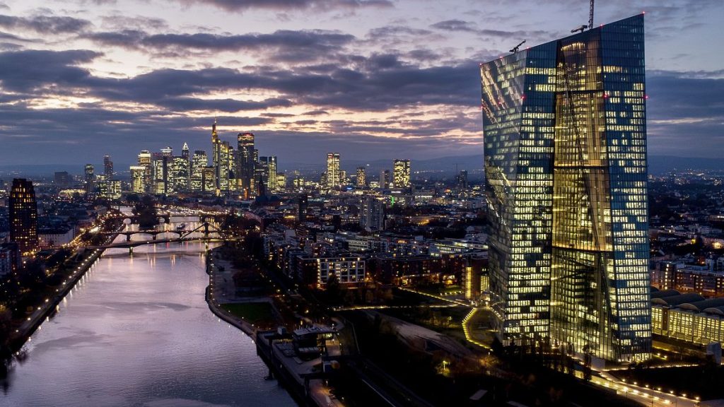 The European Central Bank, right, stands amid buildings in the banking district of Frankfurt, Germany