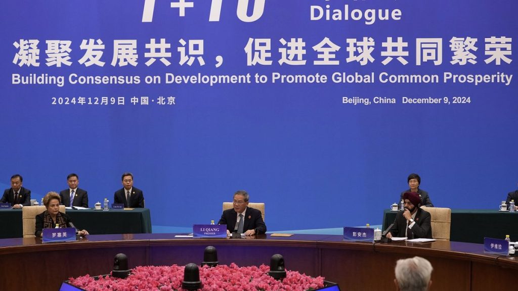 Chinese Premier Li Qiang attending a conference in Beijing on promoting world economic growth