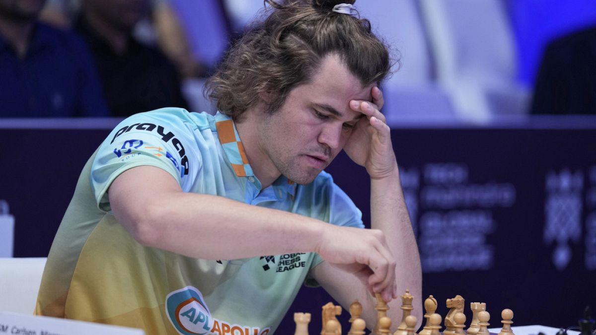 FILE - Norwegian Magnus Carlsen of SG Alpine Warriors plays Poland