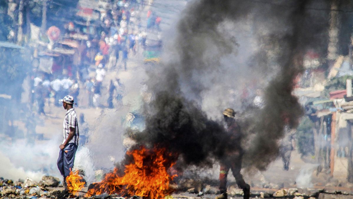 Archive: A barricade burns Tuesday, Nov. 5, 2024, in Mozambique