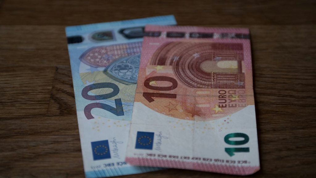 Two euro notes on a table