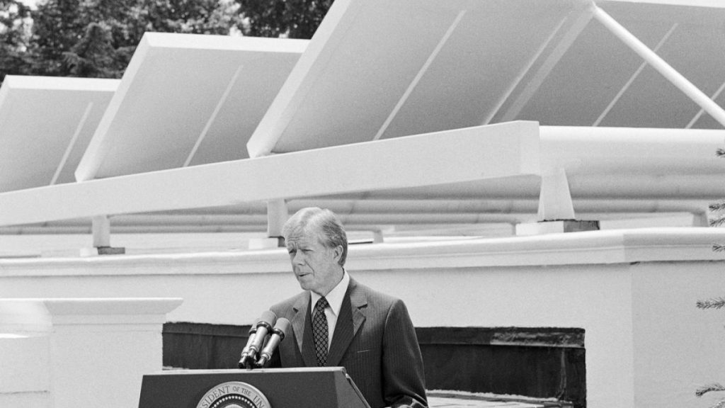 President Jimmy Carter speaks against a backdrop of solar panels at the White House, June 21, 1979, in Washington