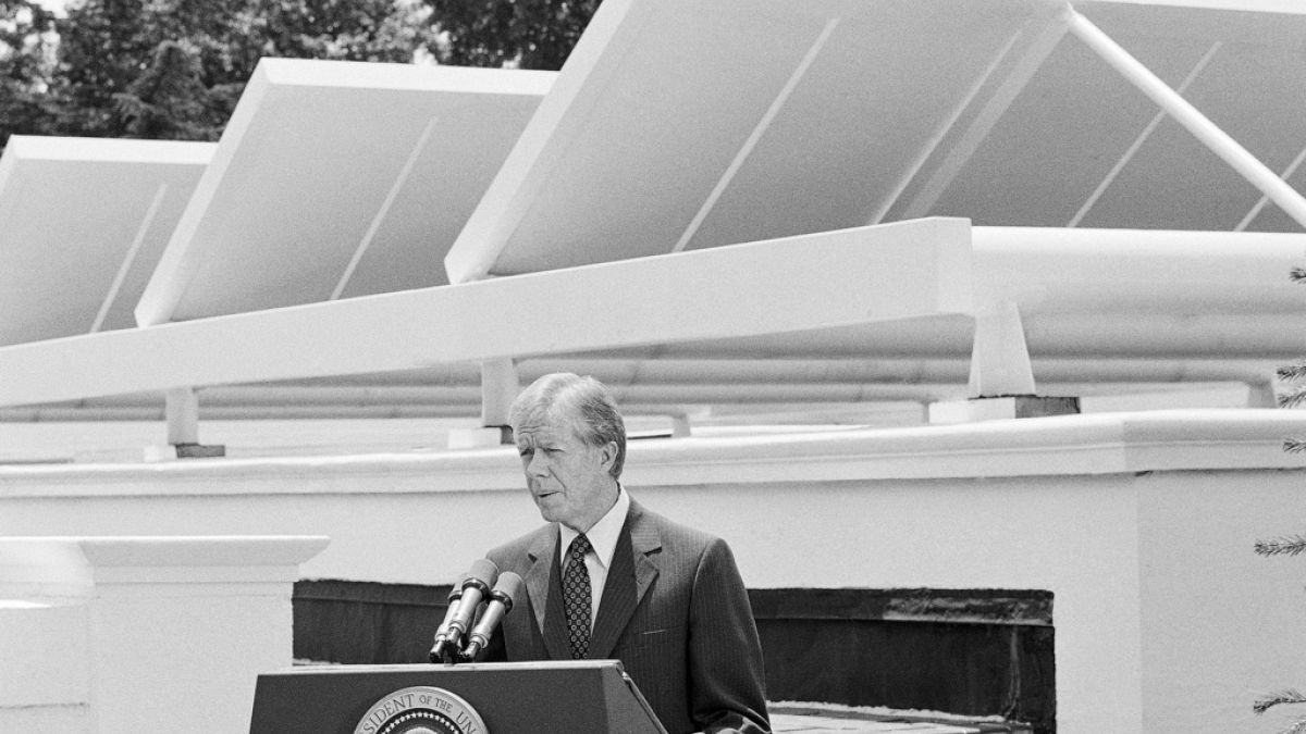 President Jimmy Carter speaks against a backdrop of solar panels at the White House, June 21, 1979, in Washington