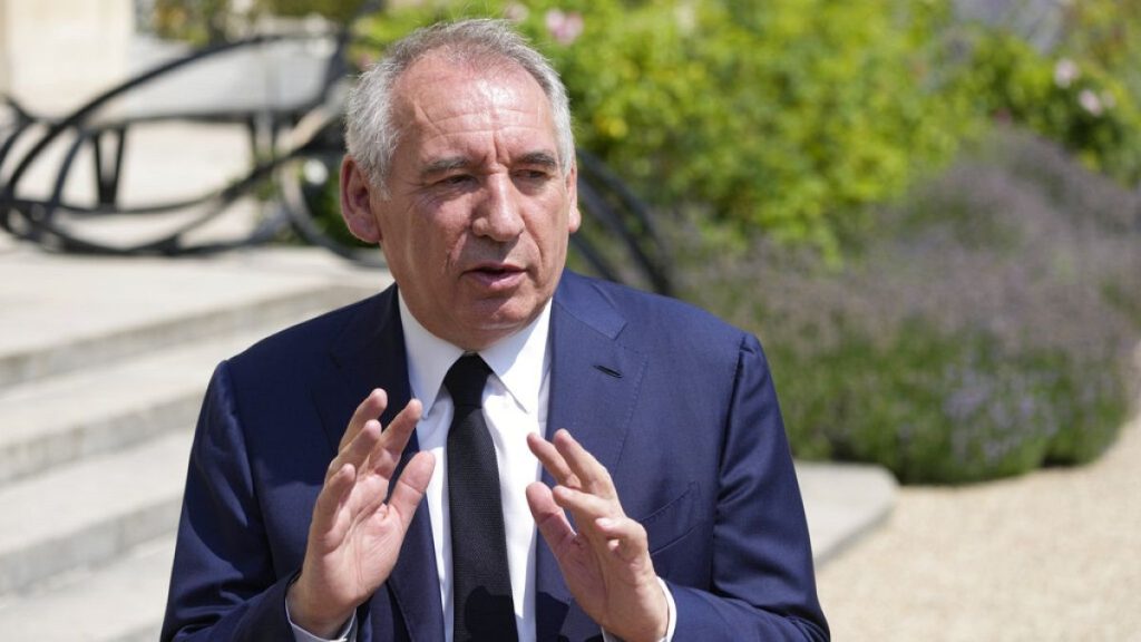 French centrist party MoDem (Mouvement Democrate) leader Francois Bayrou speaks to reporters after a meeting with France