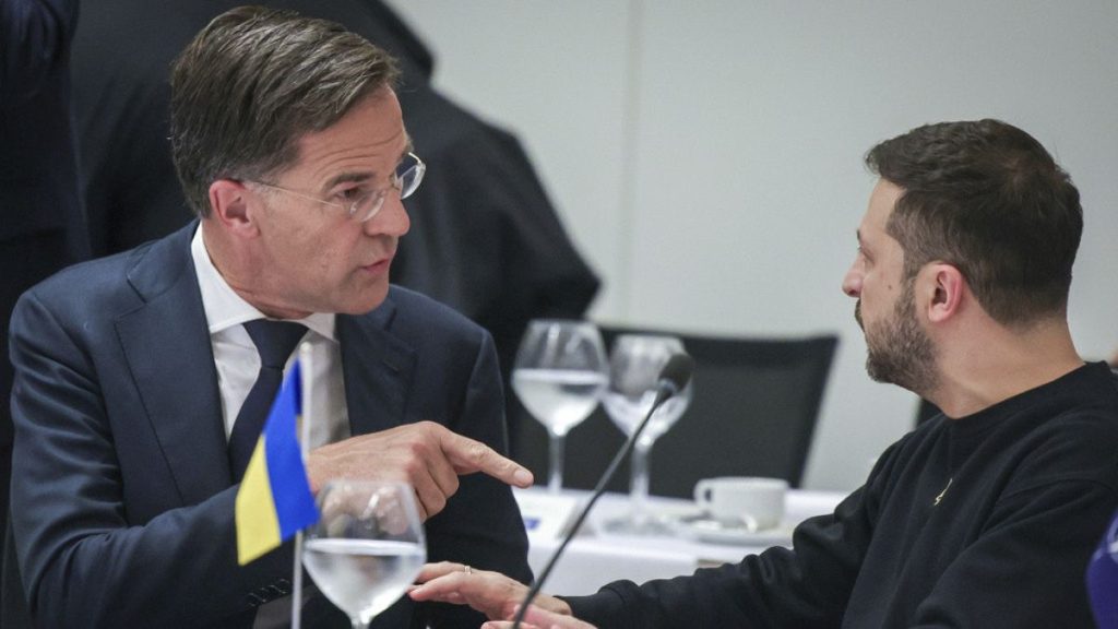 FILE: NATO Secretary General Mark Rutte, left, speaks with Ukraine