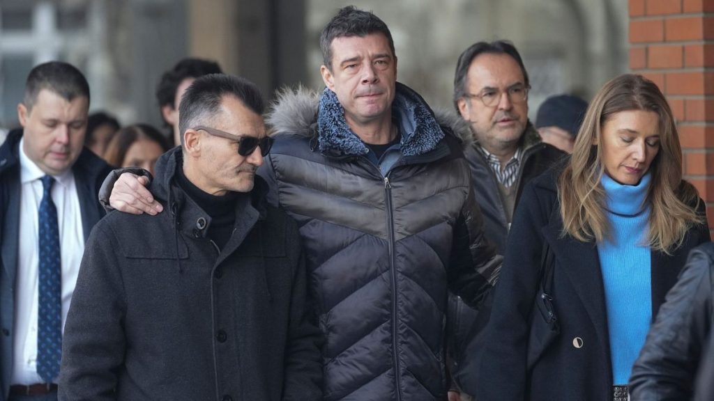 Relatives and friends of victims arrive in the court building prior to a verdict in trial of parents of a boy who killed 9 students and security guard, 30 Dec 2024.