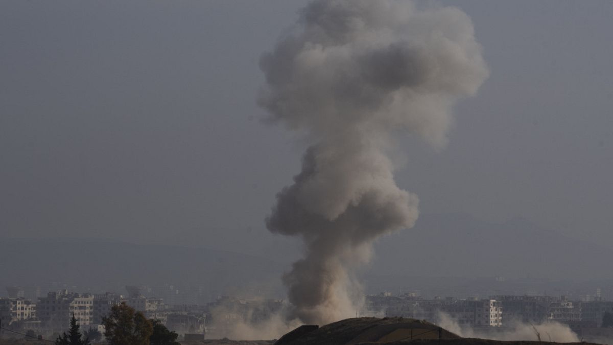 FILE - Smoke rises after an Israeli airstrike on an area in the outskirts of Damascus, Syria, Thursday, Dec. 12, 2024