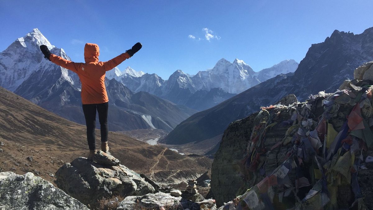 Monica Lewicka stands on a mountain during a scientific expedition in Nepal