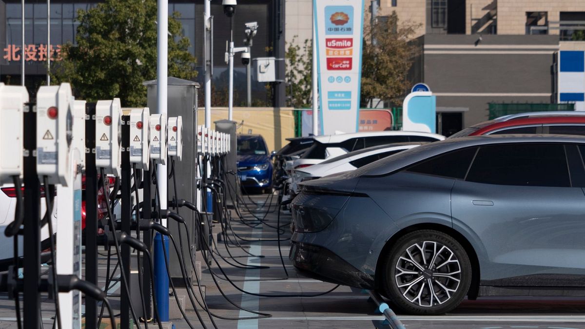 Electric vehicle charging stations are seen in Beijing, October 2024.