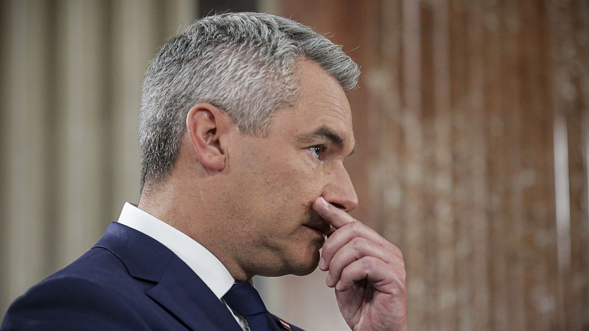 Austrian Chancellor Karl Nehammer gestures at the national broadcaster studio set up in the parliament building in Vienna, 29 September, 2024