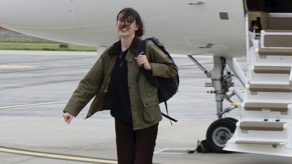 Cecilia Sala walks on the tarmac as she landed at Rome